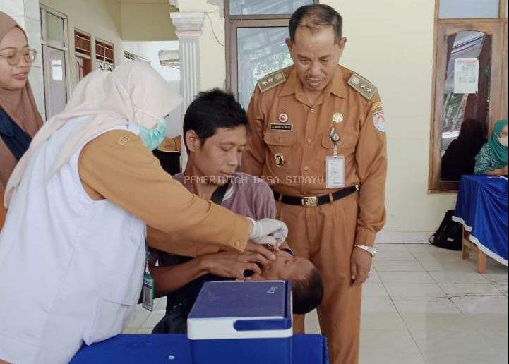 Kades Sidayu Binangun Dampingi Sub-PIN Polio di Desa Sidayu Binangun Cilacap